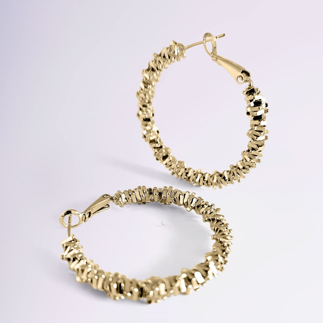 Boucles Aurore en plaqué or 18k – design torsadé moderne