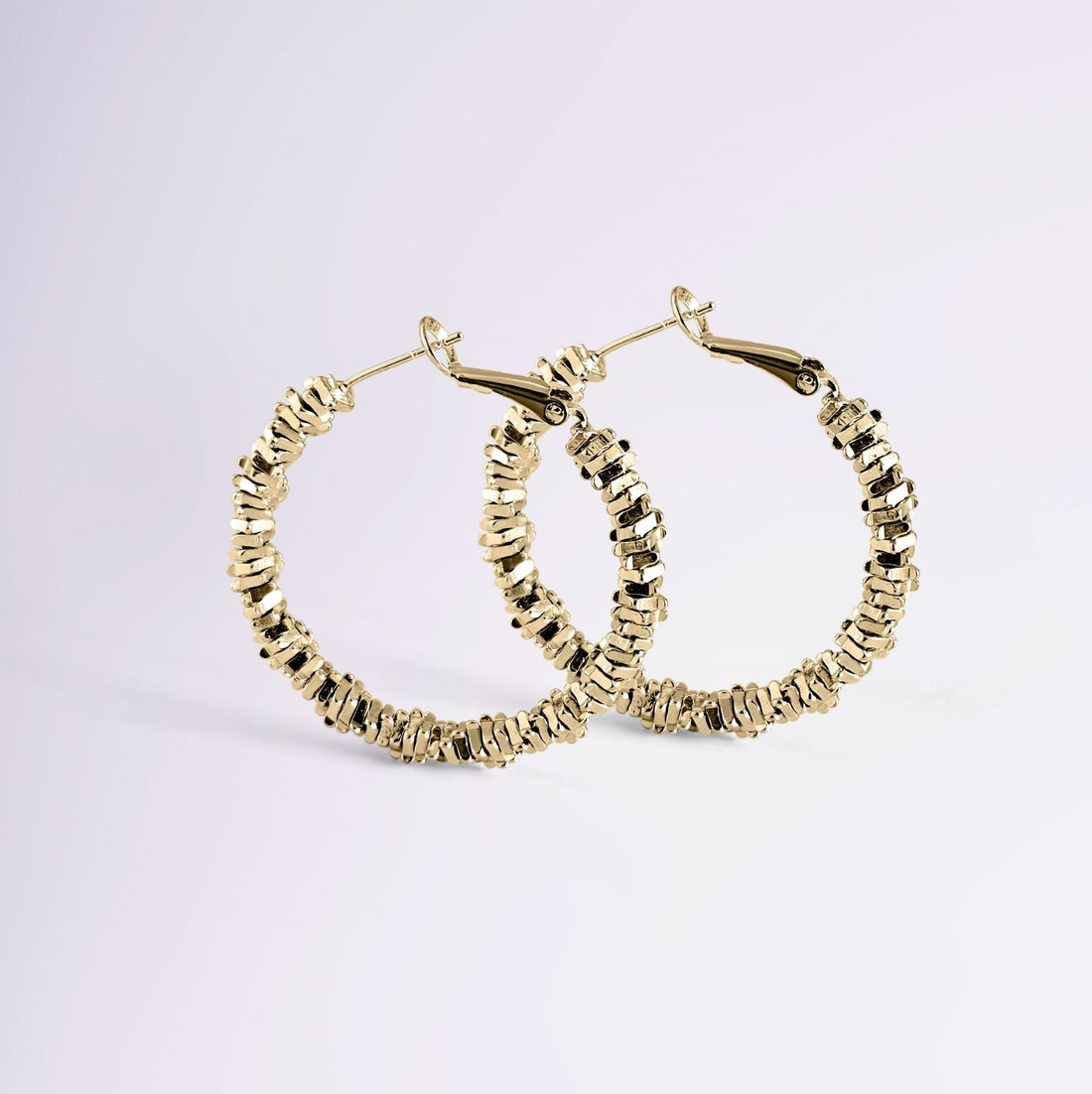 Boucles Aurore en plaqué or 18k – design torsadé moderne